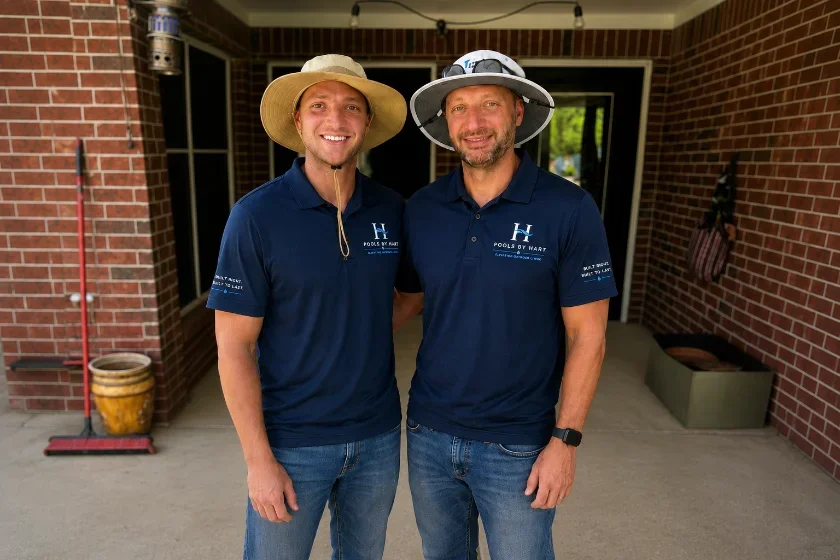 Joseph and Luke Hartman, the father-son founders of Pools By Hart, on a job site